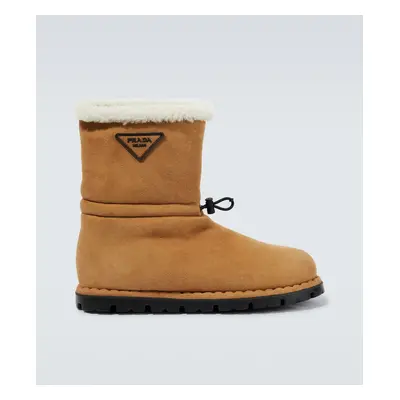 Prada Bottines en daim et shearling à logo