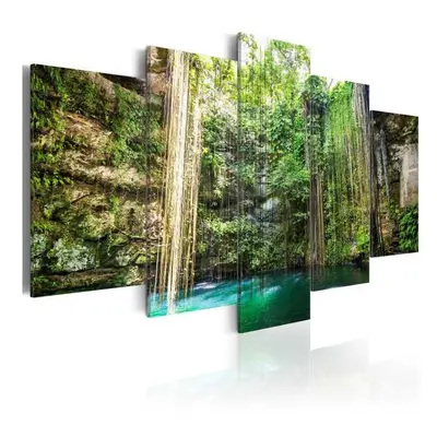 Tableau Cascade parmi des arbres